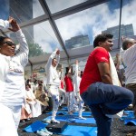 Celebrating first International Yoga Day, UN says ancient practice can boost public health and promote peaceful relations